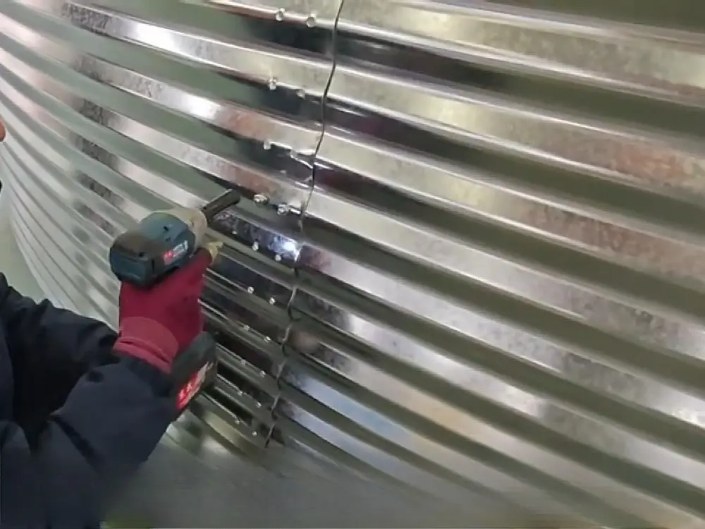 Installation steps for galvanized steel plates in a galvanized stock tank pond